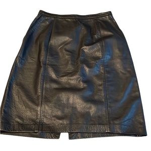 Black  size 8-10 genuine leather pencil skirt skirt with pockets back slit